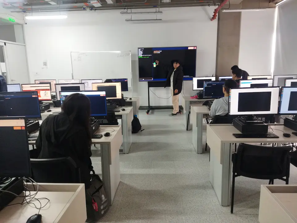 Room of computer, with a person see the computer